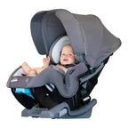 Baby Trend Cover Me™ 4-in-1 Convertible Car Seat, Scooter – Built-in Canopy, 4-Stage Growth System, Plush Comfort Padding, Mu