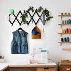 SKOLOO Accordion Wall Hanger with 16 Hooks, Modern Expandable Coat Rack Hat Rack for Wall, Solid Wooden, Natural on Black