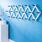 SKOLOO Accordion Wall Hanger with 16 Hooks, Modern Expandable Coat Rack Hat Rack for Wall, Solid Wooden, Black on White